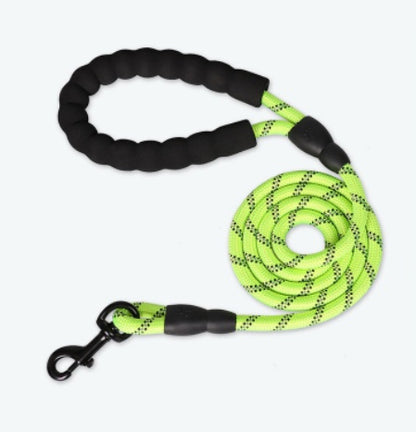 Neon green dog leash with black handles on a white background